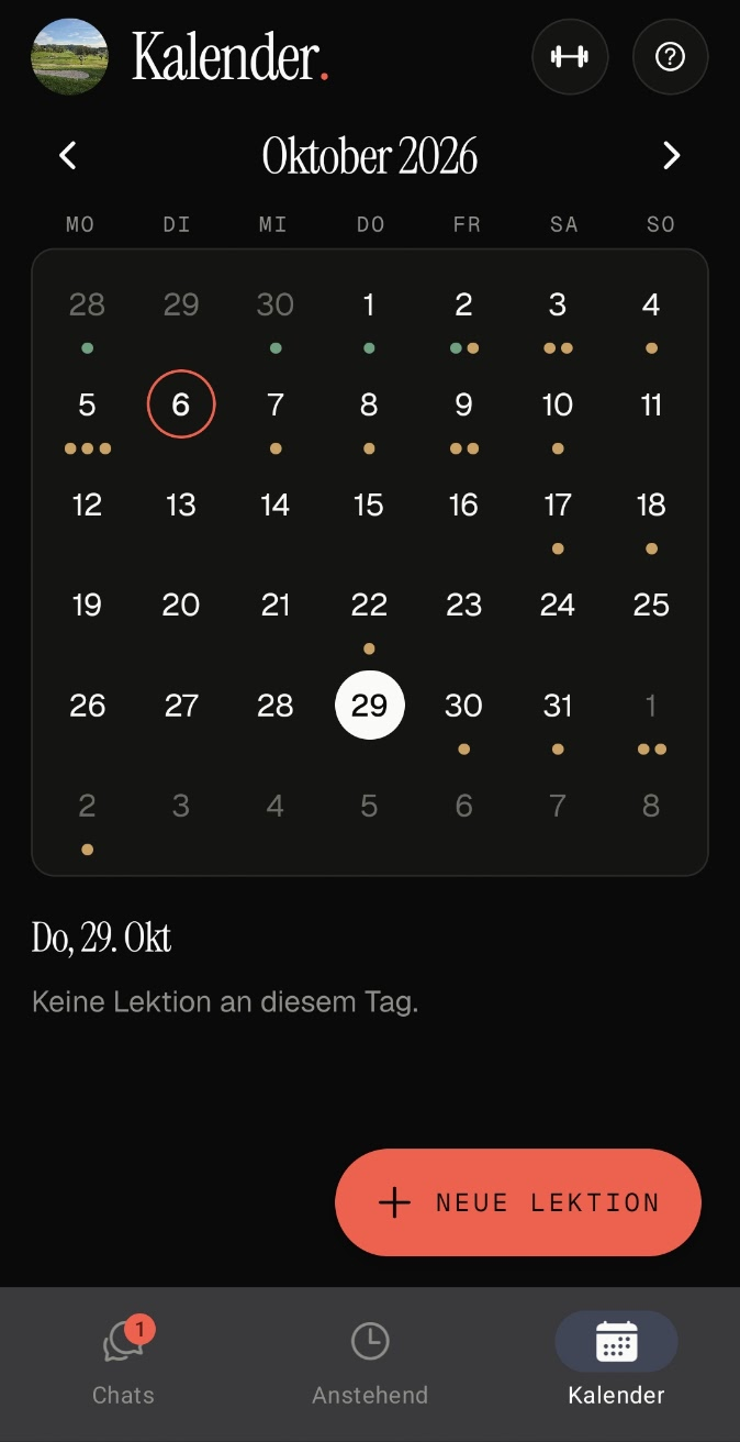 Month calendar with lessons marked per day and a button for a new lesson